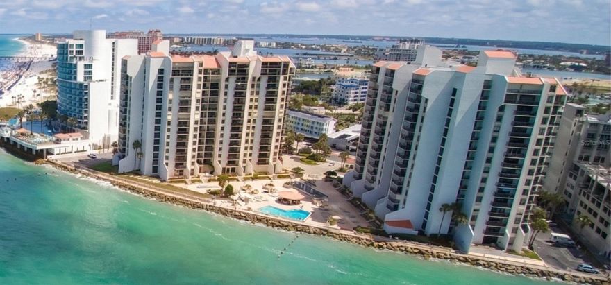 Wake up to the Gulf every morning. This stunning 12th-floor corner unit at the award-winning 440 West puts you directly on the water at America's #1 rated beach - Clearwater Beach. With 1,186 sq ft, 2 beds & 2 baths, the open living, kitchen, and private balcony deliver unobstructed, panoramic views of the Gulf of Mexico, Sand Key's southern coastline, the Intracoastal Waterway, and Sand Key Bridge. Watch dolphins play, manatees drift by, and sailboats head out to open water - all from your own balcony. Meticulously maintained, move-in ready, and available unfurnished. The significantly reduced rent is due to the possible minor inconveniences of current post-storm renovation efforts being done at 440W. Location and the incredible view are unaffected! Rent includes cable, water, sewer, trash, pool maintenance, grounds care & 24/7 security. Steps from Beach Walk, Pier 60, top dining & shopping. | 12-month lease | Unfurnished | Association approval required ($100) | Background check required | Tenant places electric in their name | No smoking | No pets.