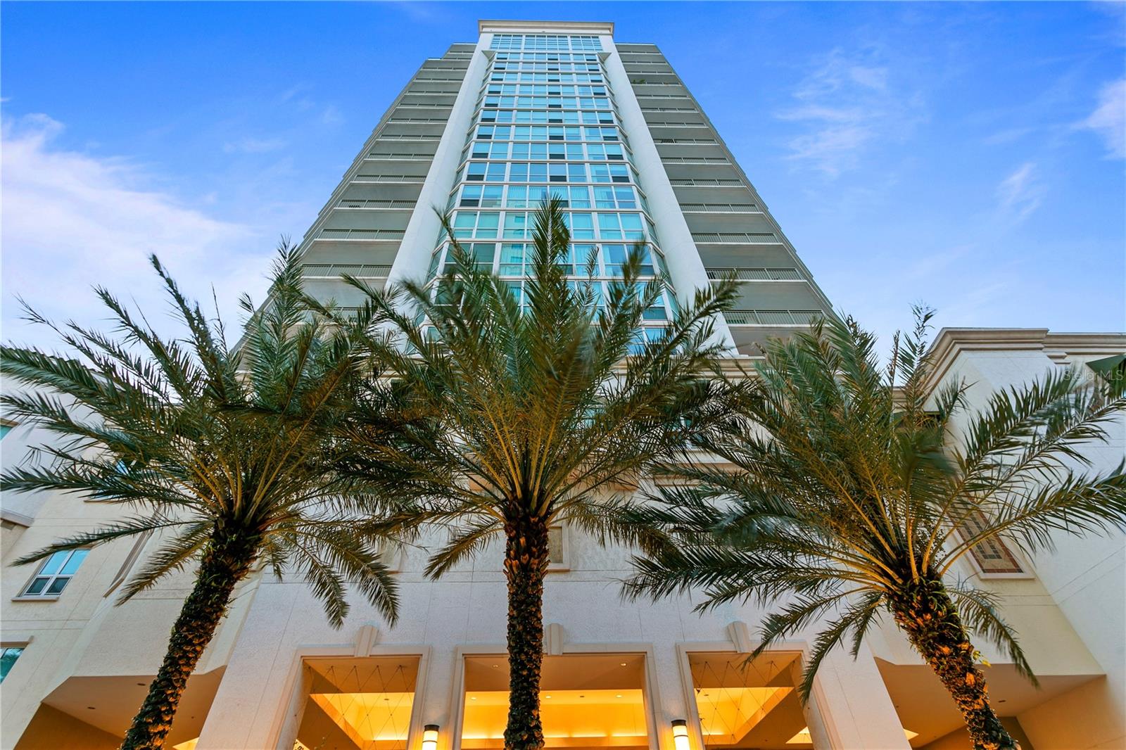 Motivated Seller! Furniture available upon request. Welcome to The Plaza on Harbour Island, voted among the most loved by Tampa Magazine's 2024 Best of the City, where elegance meets urban convenience. This stunning 4,816-square-foot condominium offers 4 Bedrooms, 4.5 Bathrooms, a Home Office, and spectacular water and downtown views from the 18th floor. Enjoy unparalleled amenities, including a full-time concierge, 24-hour doorman, valet service, and a heated infinity-edge pool with private cabanas. With 4 dedicated parking spaces, convenience is at your doorstep. The gourmet kitchen features premium Wolf appliances and Quartzite countertops, perfect for culinary enthusiasts. Entertain effortlessly in the adjacent great room, complete with a wet bar and private balcony. The owner's suite is a sanctuary of relaxation, featuring a custom walk-in closet and a luxurious master bath. With three guest bedrooms, each with en-suite baths, comfort is paramount. Additional guest suites are available onsite through the concierge. Located within walking distance to Water Street, Amalie Arena, Sparkman Wharf, and the Tampa Riverwalk, this residence is a true urban retreat. Experience the best of luxury living at The Plaza—your dream home awaits!