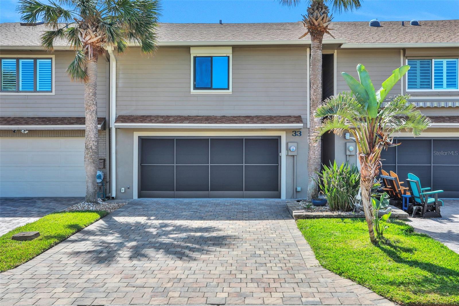 Embrace the beachside lifestyle in this turnkey FULLY FURNISHED beautifully maintained townhome. Located in the heart of Ponce Inlet just steps to the ocean! This bright and airy two-bedroom, two-and-a-half-bathroom retreat is designed for comfort, featuring abundant natural light, upgrades galore, and a spacious two-car garage. The kitchen encompasses white shaker cabinets, granite countertops, elegant backsplash and black appliances to tie everything together. Just 450 feet from the pristine, no-drive beach, this home offers the perfect blend of relaxation and convenience. All the big-ticket items are taken care of: Roof (2022), AC (2021), Water Heater (2022) and electric storm shutters! Enjoy easy access to waterfront dining, the historic Ponce Inlet Lighthouse, Jetty Park, the Marine Science Center, and local marinas. With Sea Gull Landing's low HOA fee, you'll enjoy access to a clubhouse, pool, yard maintenance, cable, and WiFi!