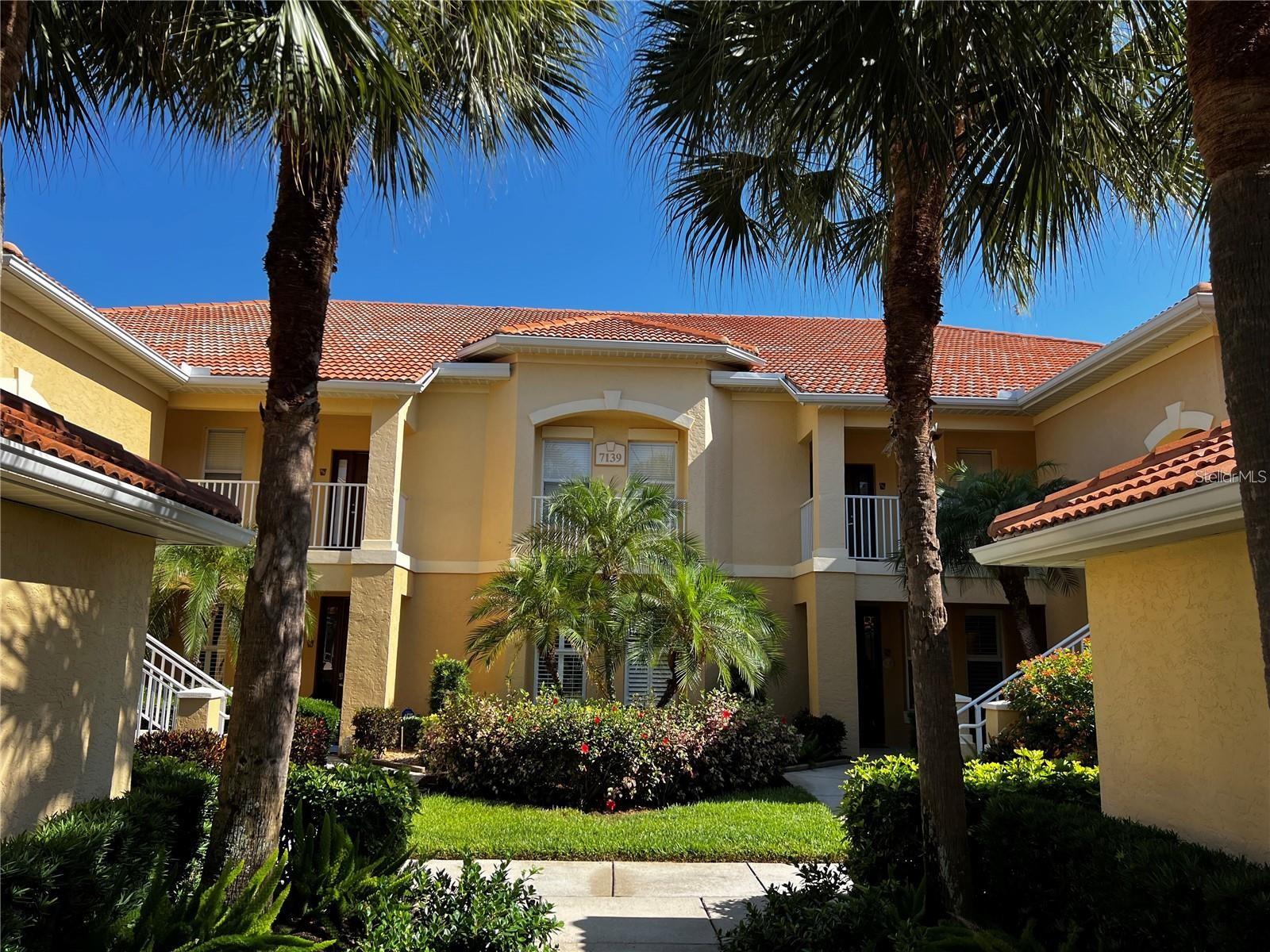 Beautiful TURNKEY FURNISHED Lakewood Ranch Country Club condo located in Boca Grove is available for an ANNUAL RENTAL. This neat as a pin, builder's model, 2nd floor condo has it all. The condo has 2 bedrooms plus a den, 2 bathrooms, laundry room, 12 ft. vaulted ceilings, crown molding, split floor plan and tile throughout. The kitchen has Corian counter tops, lots of cabinets, closet pantry, stainless appliances, breakfast nook and a breakfast bar. Dining room/living room/kitchen combination. The primary bedroom has a king sized bed, double closets, on suite bathroom with a stall shower and double sinks. The primary bedroom view is of the golf course and lake and has a door that leads directly to the lanai. The guest bedroom has a queen sized bed. The guest bathroom has a tub/shower combination. Laundry room with full sized washer and dryer. The tranquil screened lanai is perfect for your morning coffee or evening glass of wine as you watch the birds and wildlife at the pond as well as golfers go by. One car garage which allows for one car to park inside and the driveway for a second car. Two cars maximum due to the HOA rules. The Boca Grove amenities include a community pool, hot tub and club house. Basic cable, internet and water included in the rent. Annual rental only. No pets allowed. This is Lakewood Ranch Country Club living at it's finest. Call today to schedule a showing as this will not last long.