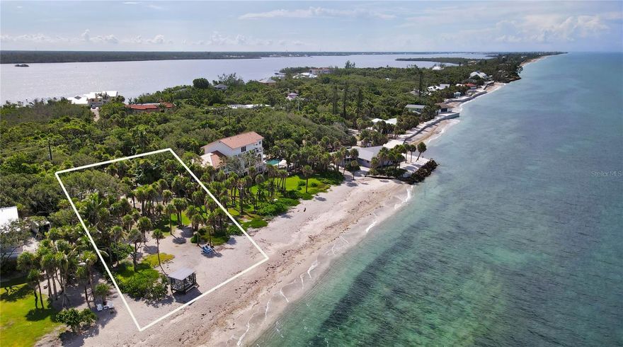 Discover the timeless allure of beachfront living at this enchanting cottage, where stepping directly onto the sandy shores of Manasota Key is a daily delight. Gated entry and full of charm, this property offers a range of opportunities, from becoming your dream permanent residence to serving as a relaxing vacation getaway or even an attractive investment property. The large lot provides the canvas to build your ideal beachfront haven while retaining the existing cottage as a quaint guest retreat. Embrace the magic of a unique and un-duplicatable, beachfront, screened gazebo, adding an exclusive touch to your coastal experience. Revel in beachside activities like fishing, paddleboarding, and collecting seashells or simply relax under the swaying palms within the serene sanctuary of your gazebo. Turnkey furnished with stainless steel appliances, including a GE refrigerator and Bosch dishwasher, this coastal abode blends modern comforts with the beauty of coastal living. A Bayside easement adds extra appeal to your coastal lifestyle. Cuddlefish Cottage promises endless adventures for everyone. Capture the magic of this unique property and schedule your private tour today.