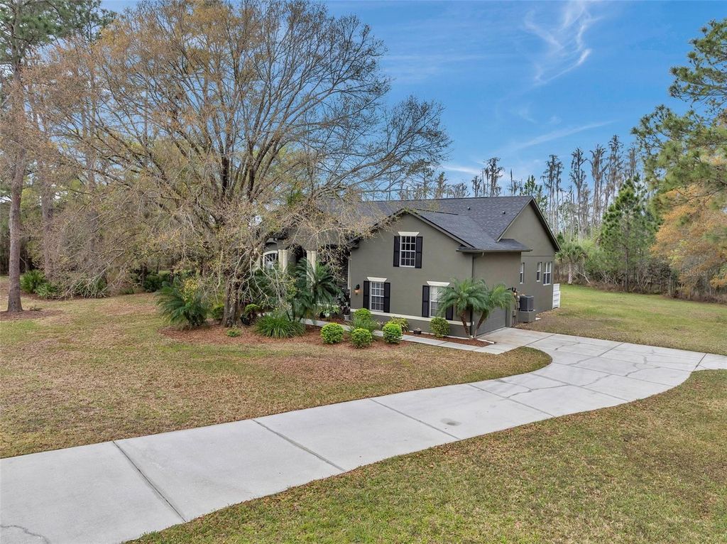 Photo of 8111 Woodleaf Boulevard, Wesley Chapel, FL 33544 (MLS # U8233442)