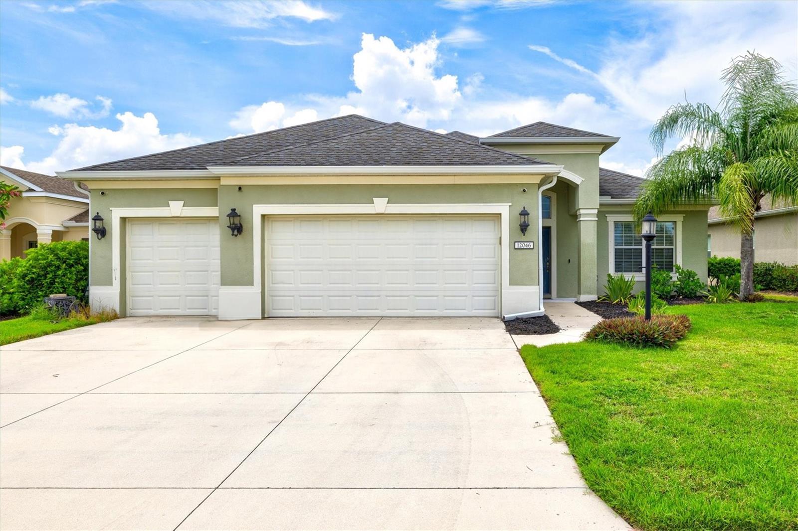 Step into a lifestyle of refined comfort with this gorgeous 2-story estate nestled within Central Park, an award winning gated community in Lakewood Ranch. Spanning nearly 3,000 square feet, this beautiful residence blends luxury and family functionality with ease. Designed for today’s modern lifestyles, the home features 5 spacious bedrooms, including dual primary suites—one on the main level and one upstairs—offering unparalleled flexibility for multigenerational living or elevated guest accommodations. A private home office plus 4 full bathrooms complete the thoughtful floor plan. Soaring ceilings, architectural tray accents, and an open-concept layout bathe the interior in natural light. At the heart of the home is the gourmet kitchen, boasting rich wood cabinetry with granite countertops, a large central island with breakfast bar and premium stainless-steel appliances. Beside the kitchen is the formal dining room that is ideal for entertaining large parties or everyday family meals. Seamless indoor-outdoor flow is achieved through pocketing sliding glass doors that invite you to enjoy your private backyard retreat. Outside you will enjoy an expansive paver patio surrounding the heated pool all overlooking the tranquil lakefront views. The home also includes a spacious 3-car garage with plenty of room for vehicles, bikes, and recreational gear. Recent upgrades include new A/C units (2021), a new water heater (2024), and a new pool heater (2024)—ensuring both comfort and peace of mind. Central Park at Lakewood Ranch is a vibrant and amenity-rich community. Residents enjoy access to tennis courts, two dog parks, a splash park for children, picnic pavilions, and scenic nature trails, all just minutes from UTC shopping, top-rated schools, fine dining, healthcare, and major interstates. Come and see why this is the one!