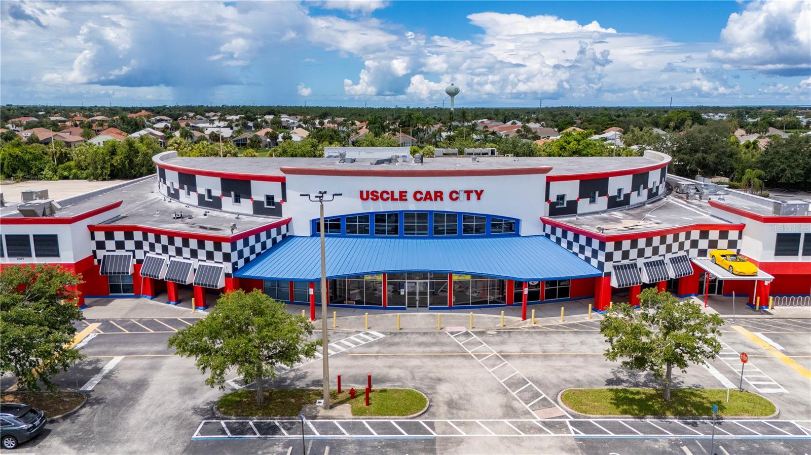 67,992 Sf. Shopping Center on 41, the Anchor(Previous site of Muscle Car City) offers 49,000 sq. feet Featuring Showroom, Offices, Plus Ten (10) Rental Units, and Seven (7) are Currently Leased, along with an Additional Free Standing Building with 9,060 square feet that is Currently Leased, the site is situated on 10.6 Acres with Great Visibility and Access to US 41 (Tamiami Trail). The Subject Property is Zoned HC with Multiple Allowable Uses. Home Depot, Publix, Walmart, Burnt Store Road, Jones Loop and I-75 Interchange at Exit 161 and the Punta Gorda Airport all within a Three (3) Miles Radis. Please note that this Listing has two parcels, address 10175 and 10169 Tamiami Trail.