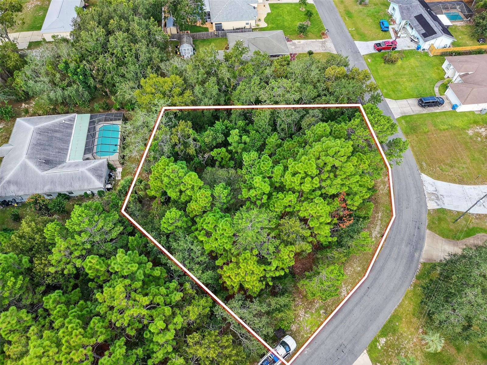BUILD YOUR DREAM HOME on this spacious 0.40-acre CORNER lot located in the heart of Spring Hill, Florida! CORNER lots are great for those who desire to build with a side entrance garage! Situated in Spring Hill Unit 18, Block 1205, Lot 10 (Parcel #R32 323 17 5180 1205 0100), this OVERSIZED property offers the perfect opportunity to create your ideal Florida lifestyle. (LOCATED directly across from 11139 Gifford Drive) With NO FLOOD insurance required, no HOA, no CDD fees, and no deed restrictions, you’ll have the freedom to design and use your land your way! There’s plenty of ROOM FOR A CUSTOM HOME, a backyard pool, or even space to store your RV or boat! This CENTRALLY LOCATED lot is just minutes from everything—schools, shopping centers, restaurants, medical facilities, libraries, and county parks. You’ll LOVE BEING SO CLOSE to local favorites like Weeki Wachee Springs State Park (home of the world-famous live mermaid shows) Buccaneer Bay water park, and the CRYSTAL-CLEAR Weeki Wachee River, perfect for kayaking and paddleboarding. Enjoy the charm of nearby downtown Brooksville with its boutique shops, cafes, and small-town appeal, or take a quick drive to the Gulf of Mexico via nearby public boat ramps. Outdoor enthusiasts will appreciate the easy access to public golf courses, hiking and biking trails, nature preserves, and local marinas. PLUS you're just a short drive from Tampa, where you can enjoy professional sports, concerts, and the convenience of Tampa International Airport. Whether you're looking to build your forever home, a seasonal getaway, or an investment property, this lot has everything you need to make your vision a reality. Don’t miss out—experience all that Florida’s beautiful Nature Coast has to offer!