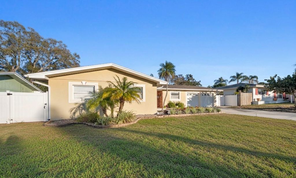 Photo of 1957 Souvenir Drive, Clearwater, FL 33755 (MLS # TB8469898)