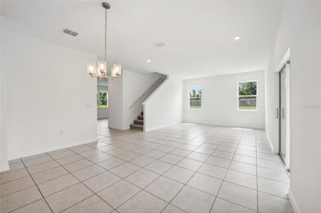 Photo of 12983 Trovita Drive, Grand Island, FL 32735 (MLS # O6333690)