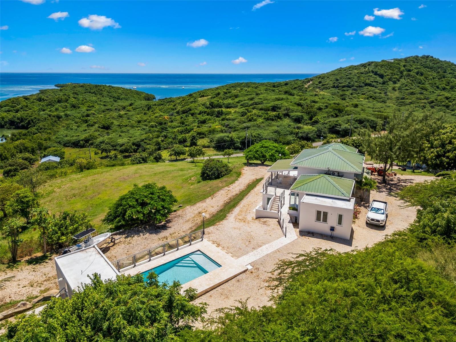 Culebra lot 21 Las Pelas
Unique and spectacular property located in one of the highest points on the east coast of the island of Culebra. Enjoy stunning ocean and mountain views from sunrise to sunset. This 4 bed 5 bath property sits on a beautiful 5 acre lot with a 3000 square foot build. Unobstructed panoramic views, large windows and high ceilings define a lifestyle of relaxed elegance. On the main level there are two en-suite bedrooms, family room, kitchen and side by side balcony. The lower level has two bedrooms, 2 bathrooms, garage and storage room. Salt water pool with water heater, full generator, 600 gallon water cistern and AAA water service.
