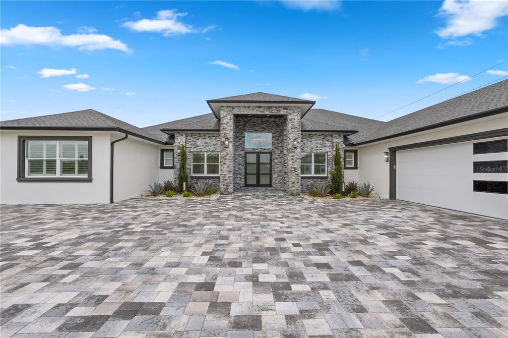 Photo of 34435 Donna Vista Place, Eustis, FL 32736 (MLS # O6432007)