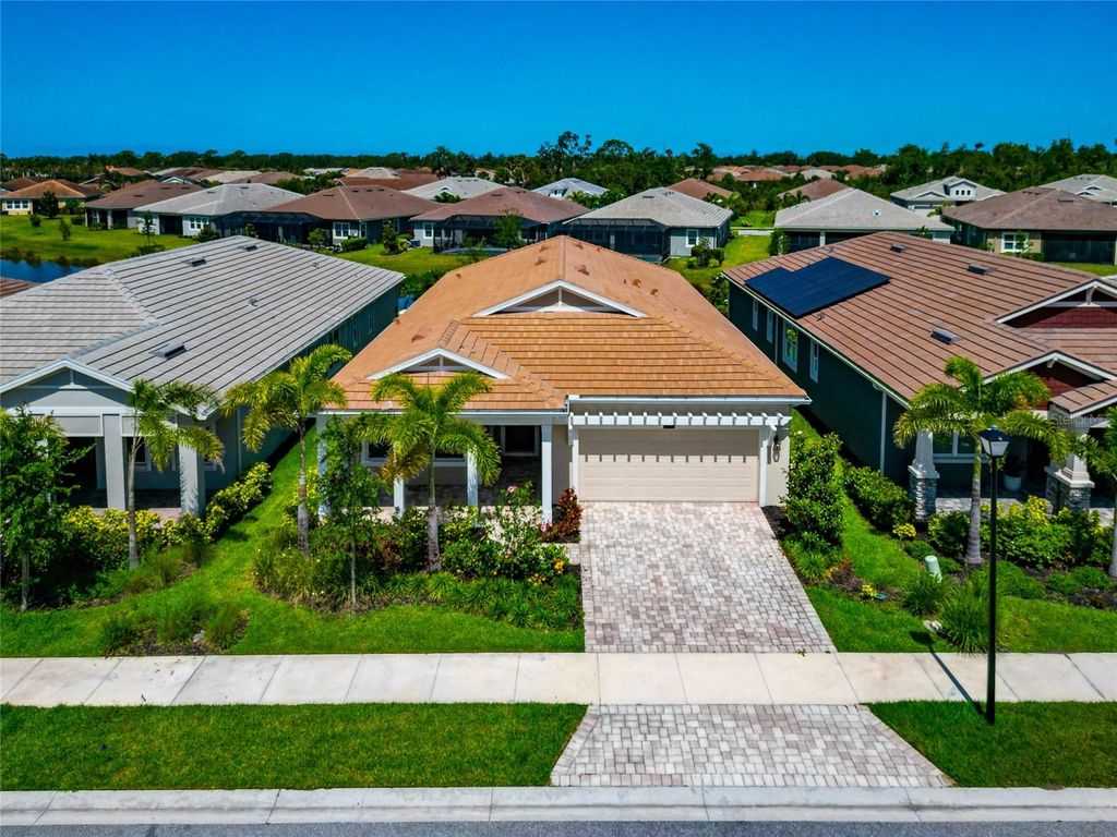 Photo of 5798 Long Shore Loop, Sarasota, FL 34238 (MLS # A4660705)