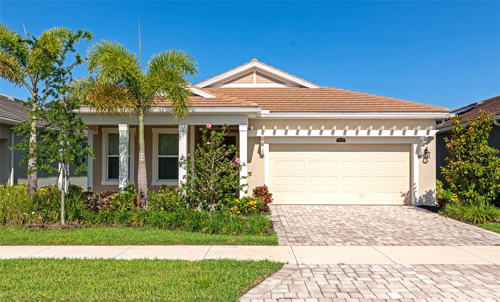 Modern Comfort & Style in Sunrise Preserve – 5798 Long Shore Loop, Sarasota, FL
Experience low-maintenance luxury living in this thoughtfully designed 2-bedroom, 2-bathroom home with a dedicated office/den, located in the highly sought-after gated community of Sunrise Preserve. Built in 2023, this home blends functionality with upscale finishes, making it perfect for everyday living and entertaining.
Step into a bright, open-concept layout featuring elegant tile flooring, tray ceilings, and high-end touches throughout. The chef’s kitchen is a standout, complete with a gas cooktop, stainless steel appliances, and a generous island that connects seamlessly to the living and dining areas.
The primary suite offers a relaxing retreat, featuring dual walk-in closets and a spa-like bathroom with double vanities and a glass-enclosed shower. The flexible office space is ideal for remote work or creative use.
Additional highlights include Gas water heater, an alarm system, and a 2-car garage.
Residents of Sunrise Preserve enjoy resort-style amenities, including a heated pool, clubhouse, fitness center, pickleball and tennis courts, and scenic walking trails. With low HOA fees, and a prime Sarasota location just minutes from Legacy Trail, shopping, dining, and top-rated schools, this home delivers comfort, convenience, and lifestyle.