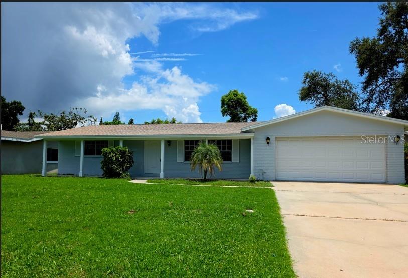 Great home located in popular location in Largo near parks, shopping and easy access to major traffic routes. Front porch welcomes you in to this home with kitchen that offers new appliances, granite counters and opens to living room and dining room. To the rear of the home is the den and seperate bonus room with fireplace, bar and access to the rear yard. Primary bedroom with partilally updated ensuite bath. Bedrooms 2 and 3 are conveniently located next to the second bath. Largo 2 car garage with laundry facility. Home also has a newer roof (4/25), new flooring and fresh paint. Enjoy where you live!