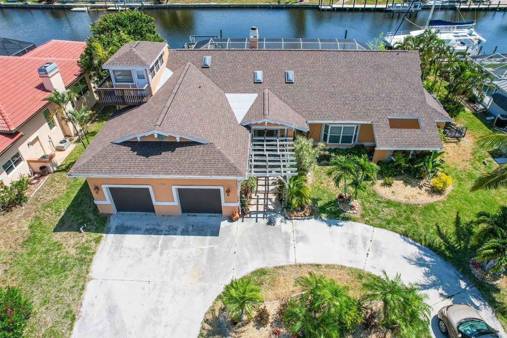 Photo of 114 Graham Street SW, Port Charlotte, FL 33952 (MLS # C7515258)