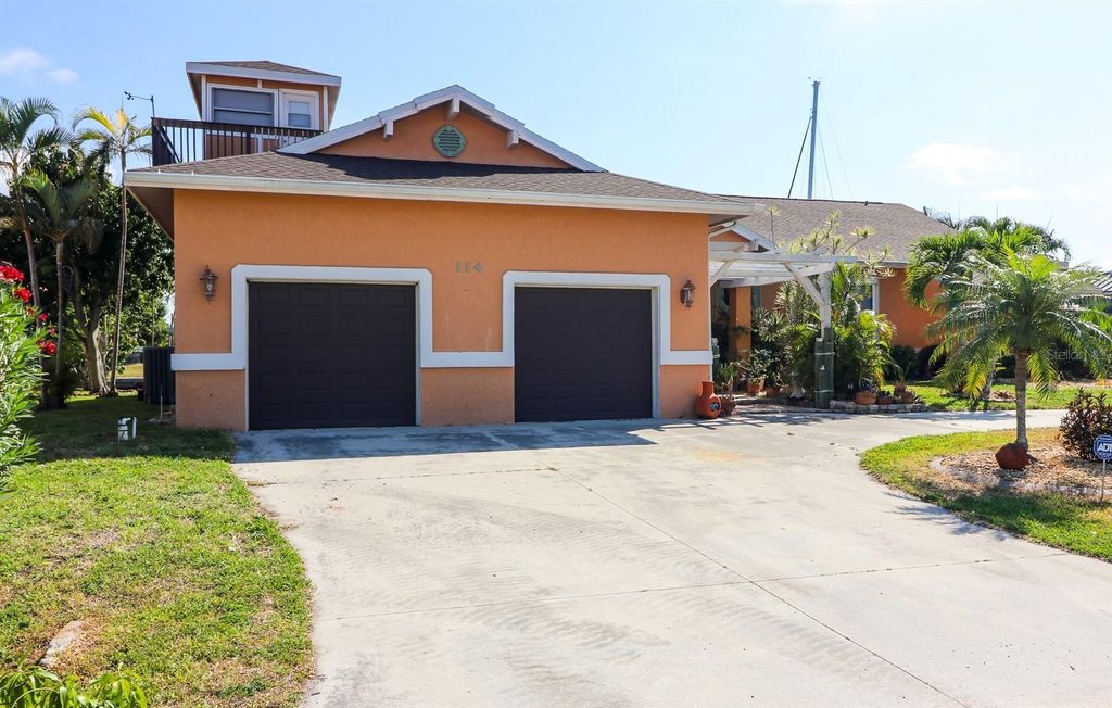 Photo of 114 Graham Street SW, Port Charlotte, FL 33952 (MLS # C7515258)
