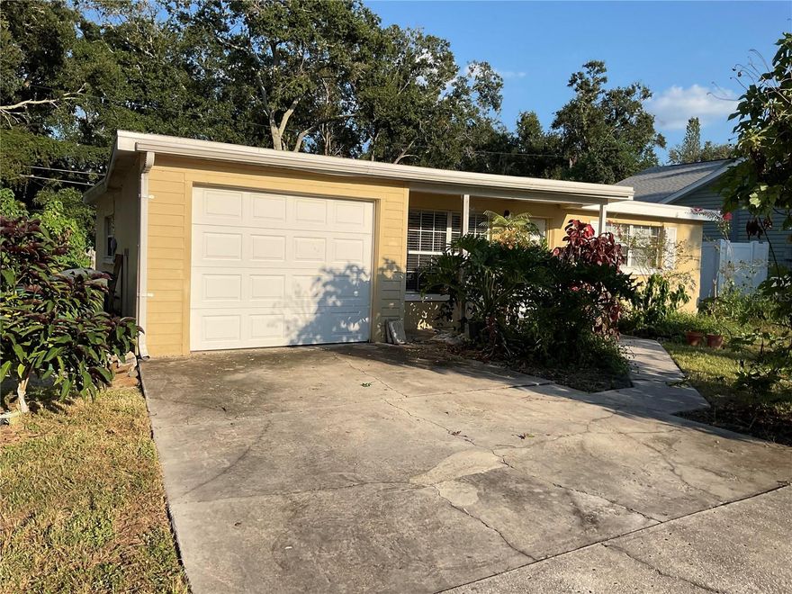Welcome home to the charming neighborhood of Bayfront Manor.  Enjoy pleasant walks with views of the bay, all while living in a home that is Not in a flood zone. This home experienced No damage in the 2024 storms. This 2 bedroom/1 bathroom split plan home with office/den is nestled in a beautiful, quiet neighborhood in Safety Harbor. The living room is light and bright, cool and charming with a cozy atmosphere. This is a wonderful home to enjoy with the family or entertain friends. The kitchen is spacious with plenty of room to put your culinary skills to work. Through the kitchen, out the back door is a screened enclosure to enjoy the sunrise or relax after a long day. Let your image run wild in this large backyard to create your own tropical paradise. Roof 2023, Hot water heater 2024, A/C 2014  Just minutes from downtown Safety Harbor’s shops, restaurants, marina, and the luxurious Safety Harbor Resort & Spa. Philippe Park, scenic trails, and nearby Beaches and a quick trip to Oldsmar and Tampa. 
No HOA and No Flood zone. This home is high and dry. Don’t let this home drift away.