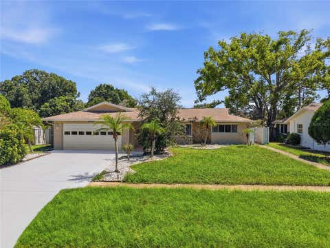 Photo of 1403 Garden Avenue, Tarpon Springs, FL 34689 (MLS # W7888387)