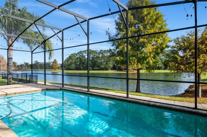 One or more photo(s) has been virtually staged. WELCOME TO YOUR DREAM WATERFRONT RETREAT! THIS STUNNING ONE-STORY HOME OFFERS 4 BEDROOMS, 3 BATHS, AND A 3-CAR GARAGE, ALL PERFECTLY DESIGNED FOR COMFORT AND STYLE. ENJOY A LARGE SOLAR HEATED SCREENED POOL (30x14) WITH PAVER DECKING AND RELAX WITH PEACEFUL WATER VIEWS—NO REAR NEIGHBORS! THE COMMUNITY WALKWAY AROUND THE WATER INVITES YOU TO UNWIND AND CONNECT WITH NATURE. INSIDE, YOU’LL FIND SOARING 10’ CEILINGS WITH CROWN MOULDING, ENGINEERED HARDWOOD FLOORS IN THE MAIN LIVING AREAS, AND A FLEX ROOM THAT CAN BE USED AS A 4TH BEDROOM OR OFFICE. THE GOURMET KITCHEN FEATURES A HUGE ISLAND, GRANITE COUNTERS, A SPACIOUS PANTRY, AND A BREAKFAST NOOK LARGE ENOUGH FOR THE WHOLE FAMILY. THE PRIMARY SUITE BOASTS AN OVERSIZED CLOSET AND A LUXURIOUS SHOWER WITH DUAL BENCH SEATS, WHILE BEDROOM 3 OFFERS ITS OWN PRIVATE EN-SUITE BATH. OUTSIDE, THE POOL AREA, AND COVERED PORCH ARE ALL FINISHED WITH BEAUTIFUL PAVERS—IDEAL FOR ENTERTAINING FRIENDS AND FAMILY. BUILT WITH SOLID BLOCK AND STUCCO CONSTRUCTION BY PULTE HOMES, THIS PROPERTY COMBINES QUALITY, BEAUTY, AND FUNCTIONALITY. DON’T WAIT—THIS WATERFRONT GEM WON’T LAST LONG!