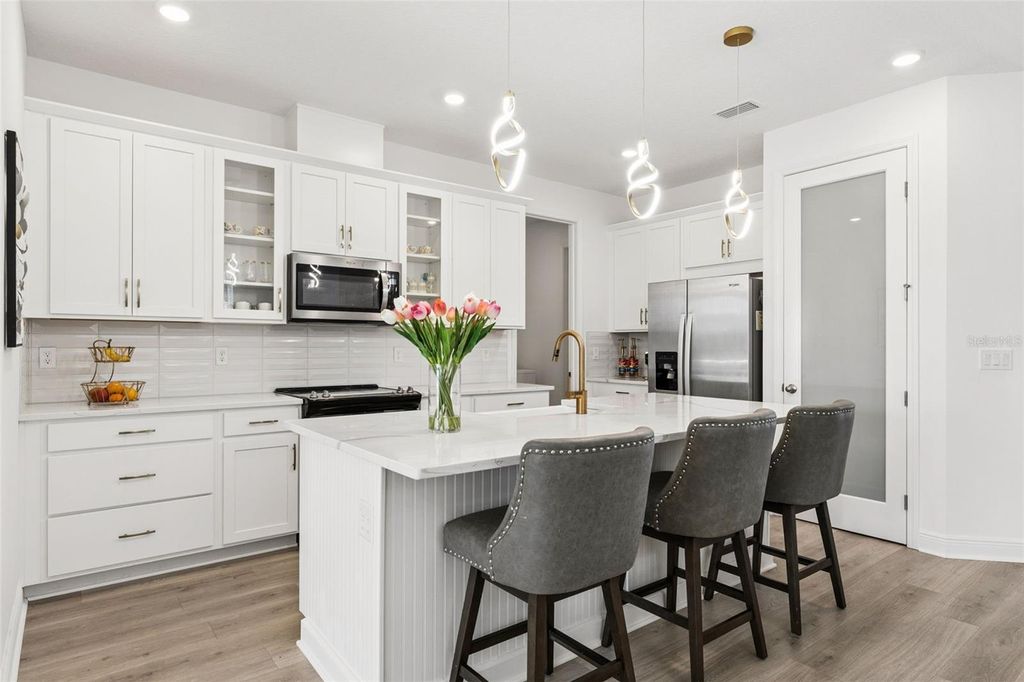 Photo of 1952 Sunshine Peak Drive, Minneola, FL 34715 (MLS # O6400492)