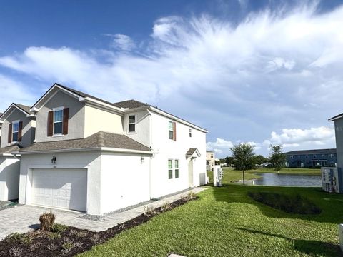 Photo of 1025 Spring Palms Loop, Orlando, FL 32828 (MLS # S5150543)