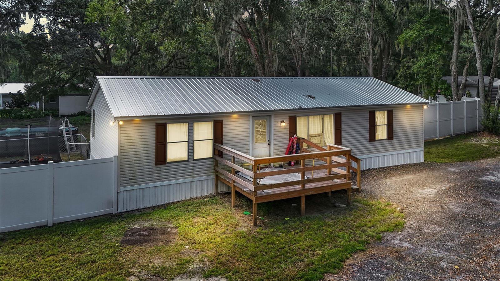 Discover the endless potential of this beautiful 18.74-acre property in Lakeland, Florida! Currently featuring a well-maintained double-wide mobile home with 3 bedrooms, 2 bathrooms, and an open-concept kitchen and living area, this land is ideal for both residential and investment opportunities. This offering includes two parcels (Parcel IDs: 232803-021000-000301 & 232803-021000-000302) located within Polk County’s Leisure/Recreation (L/R) future land-use district, as defined in Chapter 2-204 of the Polk County Land Development Code.
Permitted and feasible uses include:
• Mobile Home Park (with Level 3 Review)
• RV/Recreational Vehicle Park (with Level 2 Engineered Site Plan Review)
• Multi-family Housing or Residential Subdivision (allowed at 10 dwelling units per acre, pending site plan approval)
• Retreats, Lodges, and Other Residential or Commercial Uses (Level 3 Review may be required)
This property offers exceptional development flexibility, making it an excellent opportunity for builders, developers, or anyone seeking a unique, large parcel in a prime location. Please refer to Chapter 2-205, Table 2.1 of the Polk County Land Development Code for additional permitted uses, or contact Polk County Planning & Zoning for more information.