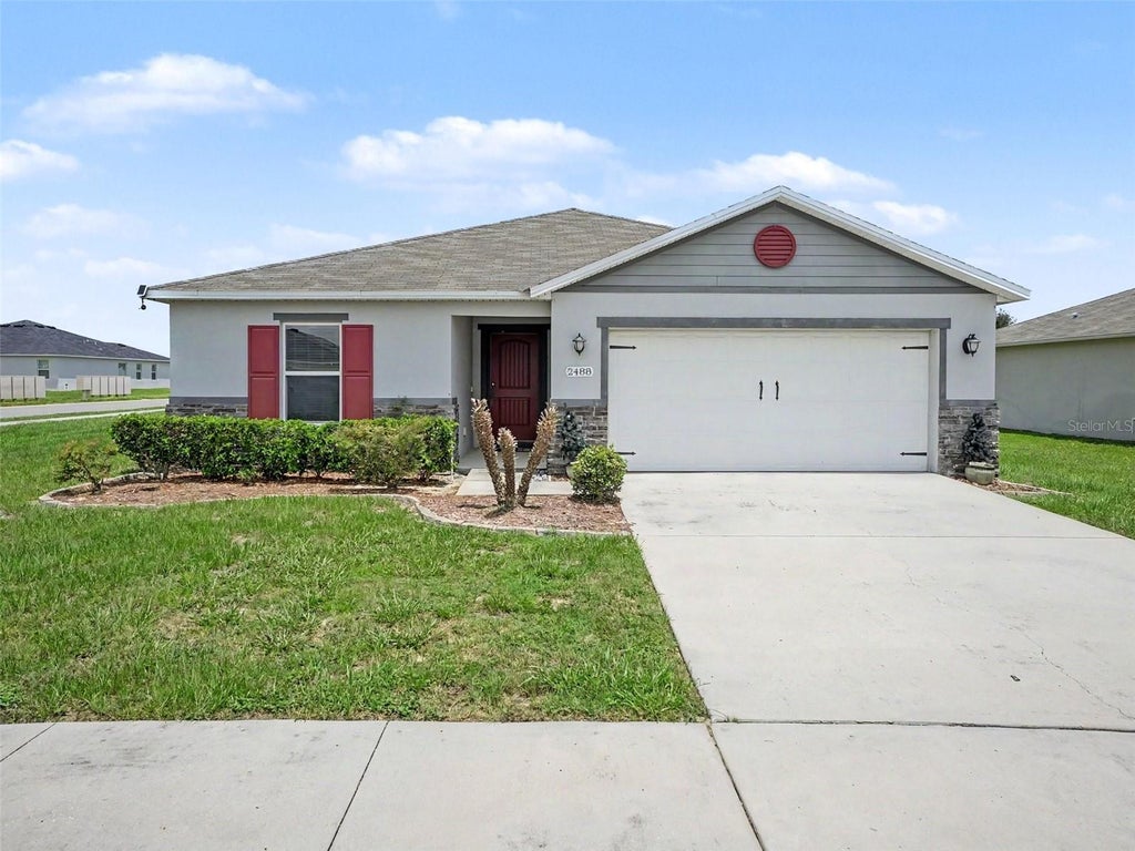 Photo of 2488 Begonia Street, Mascotte, FL 34753 (MLS # O6429077)