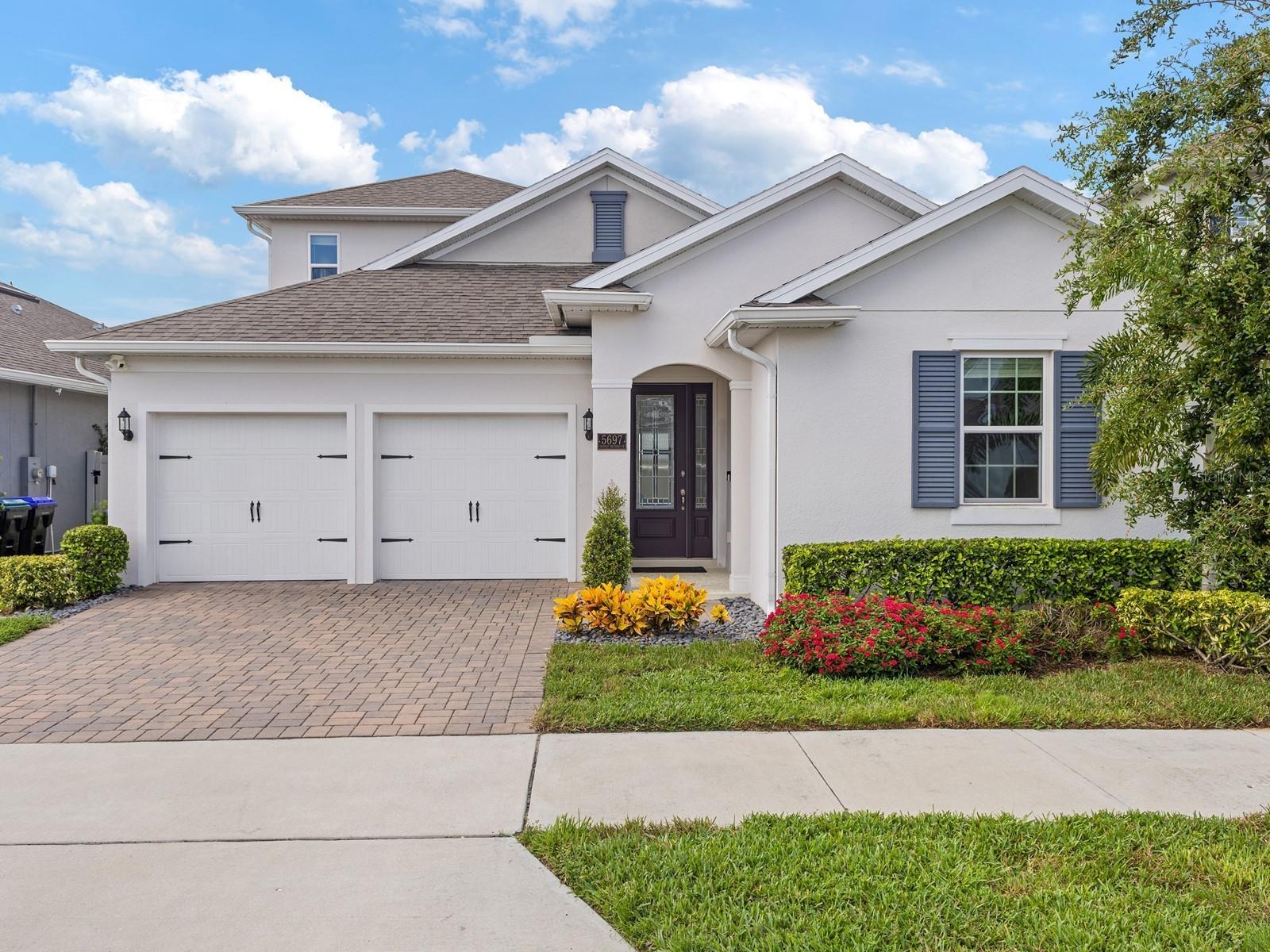 Experience the perfect blend of comfort and modern design in this exceptional 5-bedroom, 3.5-bathroom home located in the highly sought-after community of Wincey Groves in Hamlin. Thoughtfully crafted with high-end finishes and a versatile layout, this residence offers the ultimate Florida lifestyle. Step inside to an open and airy floor plan highlighted by porcelain tile flooring, high ceilings, and an abundance of natural light. The gourmet kitchen serves as the heart of the home, featuring 42-inch cabinets with crown molding, quartz countertops, a custom subway tile backsplash, and premium stainless steel appliances. A spacious center island with seating provides the perfect space for gathering, while a walk-in pantry adds convenience and storage. The primary suite is a private retreat, offering two expansive walk-in closets and a spa-inspired en-suite bath with dual vanities and a large walk-in shower. Upstairs, a generous bonus room with its own full bathroom, walk-in closet, and dedicated HVAC system offers unmatched flexibility—ideal as a fifth bedroom, media room, home office, or private guest suite. Outside, enjoy Florida living year-round under the covered lanai overlooking a fully fenced backyard —a rare find and currently the most economical pool home in all of Hamlin. Additional features include a two-car garage with ample storage and a refined finish. Perfectly situated just minutes from Hamlin Town Center, you’ll enjoy close proximity to premier shopping, dining, top-rated schools, and seamless access to major highways—with Walt Disney World only minutes away. Don’t miss this exceptional opportunity to enjoy luxury living at an unbeatable value. Schedule your private tour today!