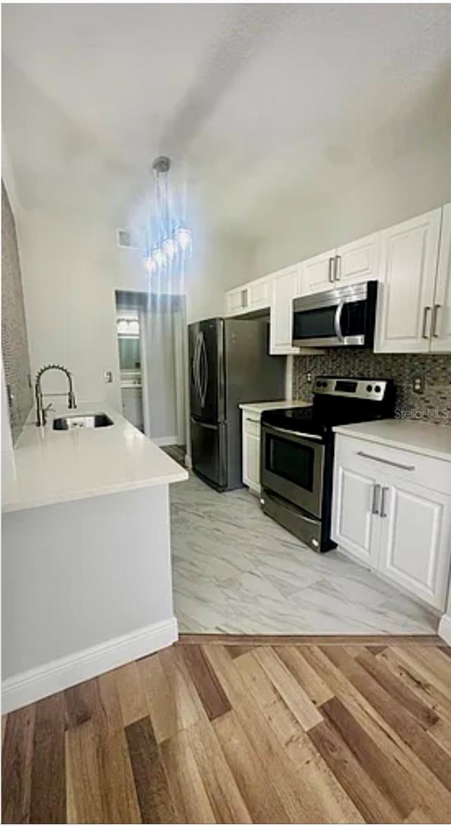 Photo of 2586 Robert Trent Jones Drive #1132, Orlando, FL 32835 (MLS # O6431825)