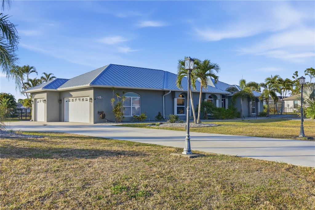 Photo of 978 Boundary Boulevard, Rotonda West, FL 33947 (MLS # D6146167)