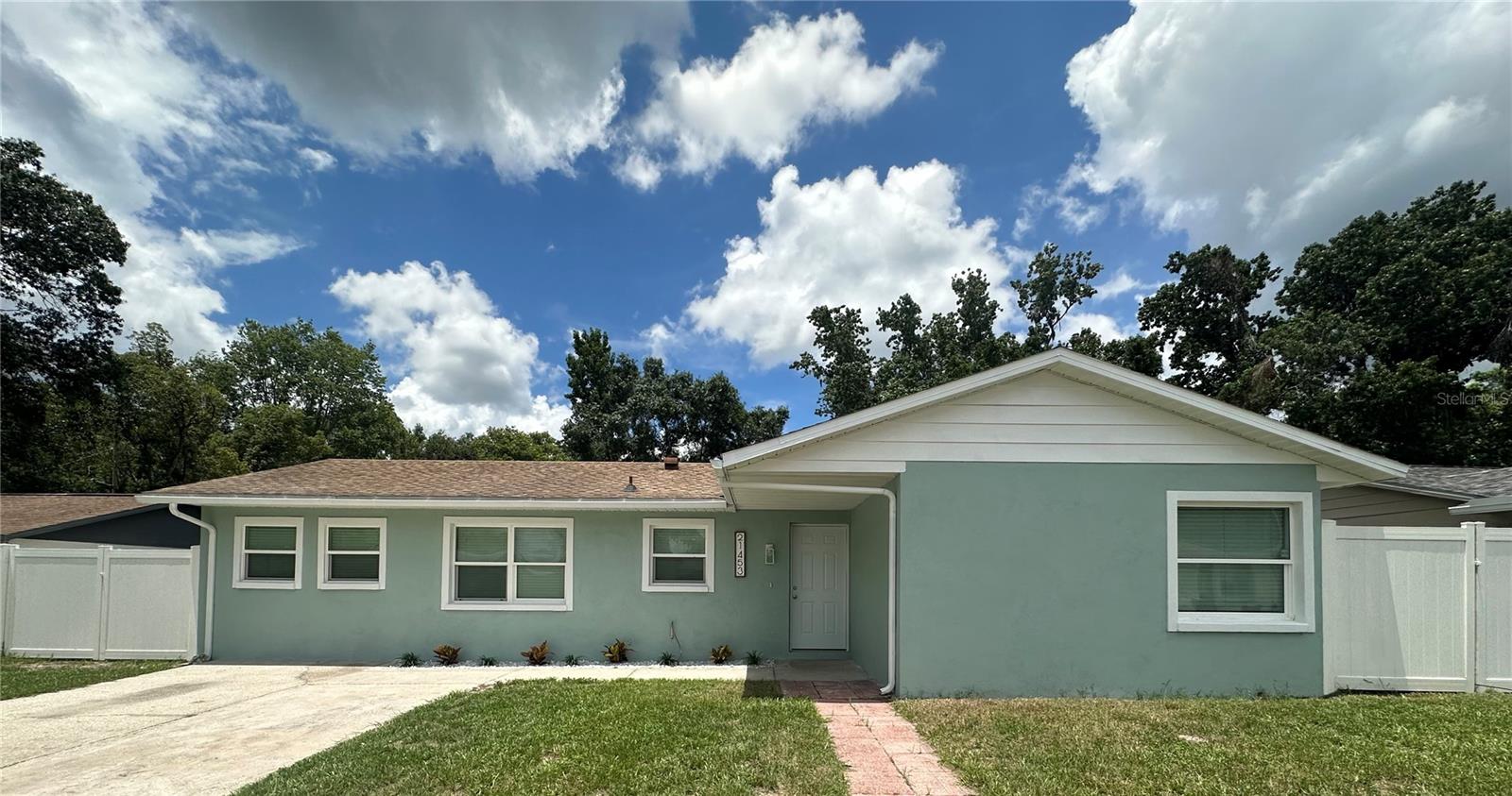 Looking for a great rental in Lutz, Florida? This 3-Bedroom, 1-Bathroom Single Family Home has 1,500 sqft of living space. Tucked away in a quiet and safe neighborhood is a property the family will refer to as home! The Owner's Suite has a walk-in closet, and the home features a custom kitchen with updated appliances, central A/C, and easy-to-clean tile floors throughout. There are washer and dryer hookups, a screened-in patio for relaxation and a big fenced-in yard with a double gate, perfect for a family and/or pets. This home sits high and dry with no flooding issues. Super convenient location, just 10 minutes from I-275, I-75, and the Veterans Expressway, so you can get to Tampa, shopping, and dining in no time. Pets are allowed with breed restrictions and a max weight of 25lbs.