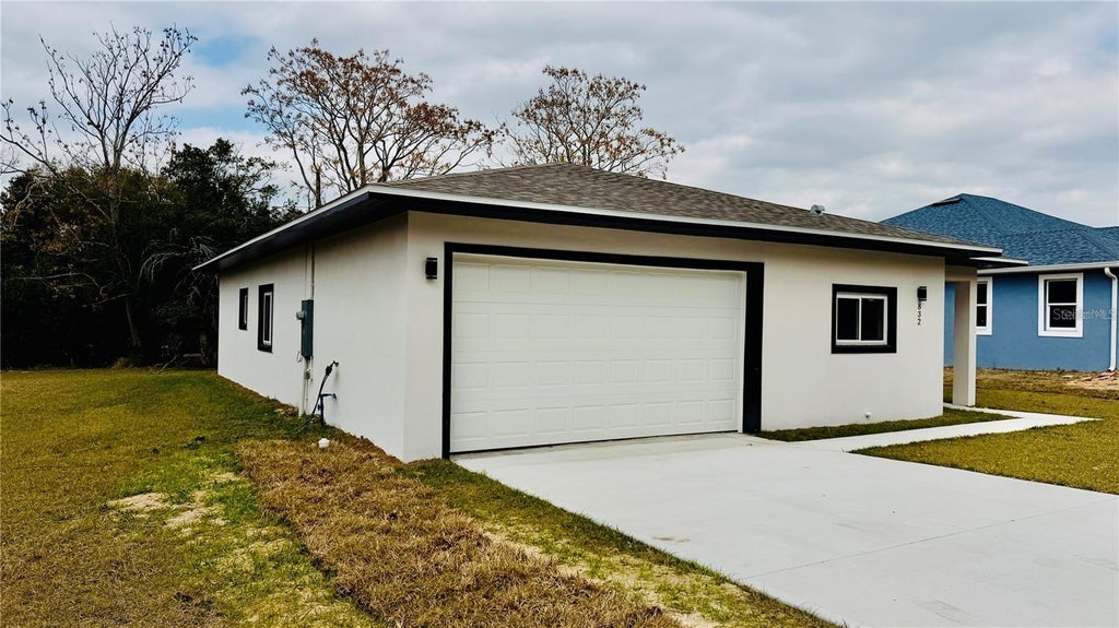 Photo of 832 E Desoto Street, Clermont, FL 34711 (MLS # O6444304)