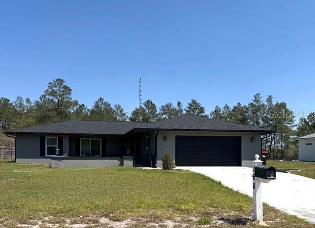 Photo of 168 Marion Oaks Golf Way, Ocala, FL 34473 (MLS # O6385949)