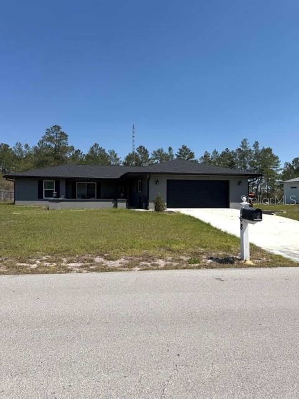 Photo of 168 Marion Oaks Golf Way, Ocala, FL 34473 (MLS # O6385949)