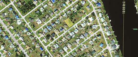 Photo of 836 Linnaen Terrace NW, Port Charlotte, FL 33948 (MLS # TB8525790)