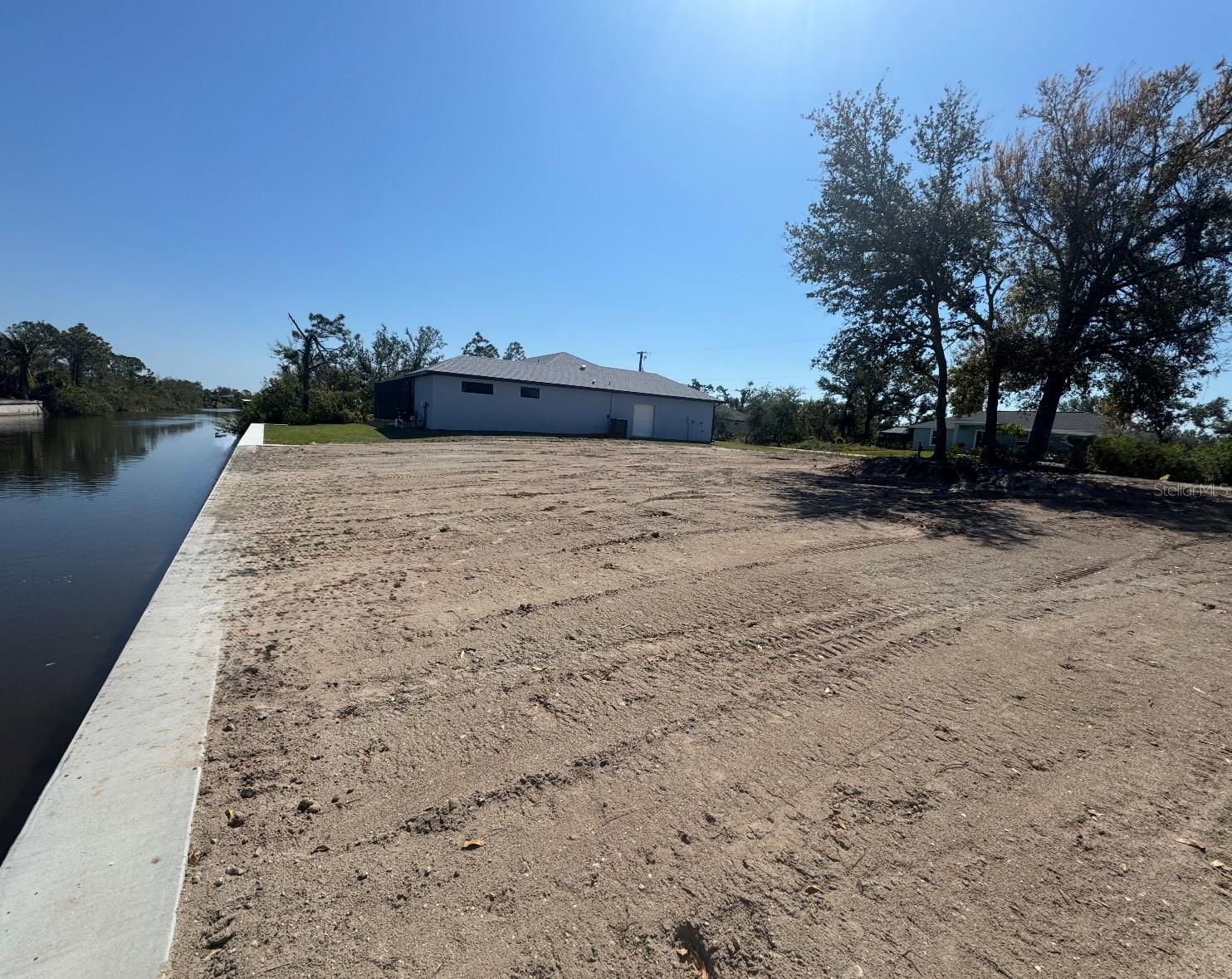 Build Your Dream Waterfront Home in South Gulf Cove!
Welcome to 13156 Amaryllis Circle, a premium waterfront lot in the highly desirable South Gulf Cove community. This property is cleared, build-ready, and not in a scrub jay zone, offering a smooth start for your future home.
Enjoy peace of mind with a brand-new seawall and new private dock already in place. From your backyard, the wide canals provide easy access to the Myakka River and on to the Gulf of Mexico, perfect for boating, fishing, and exploring Southwest Florida’s waterways.
The lot was closely monitored during the 2024 hurricanes—the water line never breached the canal edge and Amaryllis did not flood, making this one of the safest waterfront streets in South Gulf Cove. Also, one of the only waterfront properties that you can completely walk to the waterline. No need to pretend what your views would be, you can see them already! All serious offers welcome!
Additional highlights include:
-Cleared, build-ready lot
-Street access to utilities
-Brand-new seawall & private dock
-Direct canal access to Myakka River & Gulf
-Not in a scrub jay zone
-Seller financing available
(With seller financing options you have the ability to enjoy your dock and water access now while planning your build. This is a rare opportunity to secure prime waterfront property in one of Florida’s most sought-after boating communities. Why pay for mooring when you can own the property)
