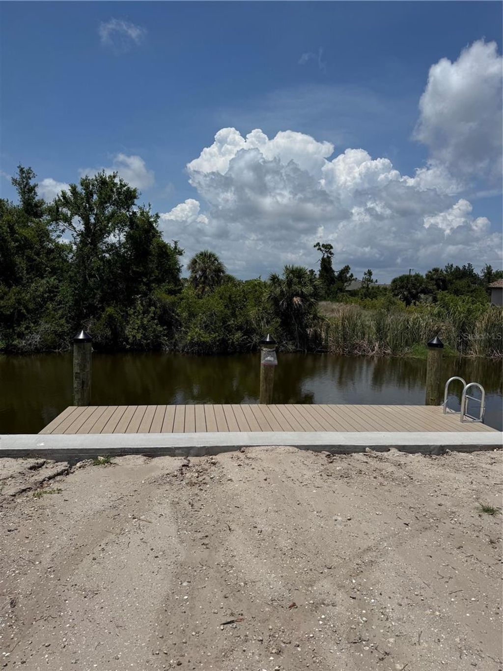 Photo of 13156 Amaryllis Circle, Port Charlotte, FL 33981 (MLS # O6339161)