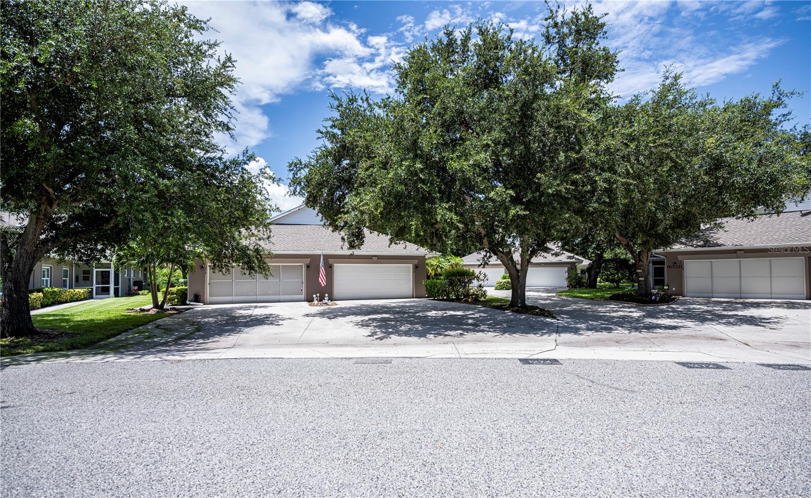 New Price Reduction! Priced to sell quick1 Popular Heritage Oak Park Villa! Rarely available w/only 16 units like this on this quiet cul-de sac street Private wooded view from the screened lanai! Villa has a roomy 1561 sq. ft. under air & offers 3 bedrooms, 2 full baths & a large 2 car garage! Comes Fully Furnished except no mattress/springs in master bedroom. Features inc. a large great room w/tray ceiling, glass sliders out to the lanai, & is open to the kitchen, which is great for entertaining. Kitchen has a breakfast bar, tubular skylight, raised panel cabinets & is equipped with deluxe kitchen appliances. Off the kitchen is a large dining area & a built in desk area w/cabinets. Master bedroom is very roomy w/a door to access the lanai, good-sized walk-in closet & has an ensuite master bath w/garden tub, walk in shower, private toilet area, dual sinks & tubular skylight for light. Interior laundry room w/deluxe full-size washer & dryer w/upper cabinets for storage & laundry tub. Split bedroom floorplan with second bath conveniently located off the hallway by the 2nd & 3rd bedrooms & has a tub shower. There is also a pantry/linen closet in hallway. Other upgrades & features inc. volume ceilings thru-out, newer plank luxury vinyl flooring in main areas & 3 bedrooms, tile floors in both baths, laundry & lanai, tiled front entry, glass insert in front entry door, accordion hurricane shutters thru-out, window treatments & ceiling fans thru-out, new shingle roof in 2018, new A/C-Heat in 2022, & new water heater in 2017. Garage has pull down staircase, 2 storage cabinets, work bench, extra refrigerator, generator (as is), & golf cart (needs battery) included. (This group of villas are condos so exterior of villas is taken care of by the association.) Low Quarterly fee of $750 Qtr. Heritage Oak Park is an active gated community located in the Murdock area of Port Charlotte! It offers a large clubhouse, heated pool, fitness room, billiards room, library, tennis courts, pickle ball, shuffleboard, bocce ball & a walking trail around the large lake! There is an activities director on staff planning many activities for your enjoyment! Built around all the old oak trees you feel like you are in the country yet it is only walking distance of Publix, the YMCA, and only a short drive to major shopping & restaurants!