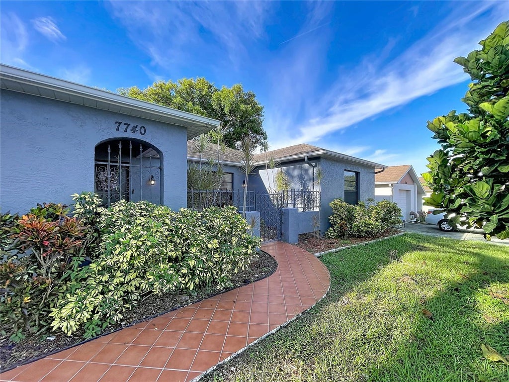 Photo of 7740 Turnbridge Drive, Port Richey, FL 34668 (MLS # W7889864)