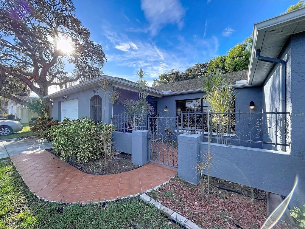 Photo of 7740 Turnbridge Drive, Port Richey, FL 34668 (MLS # W7889864)