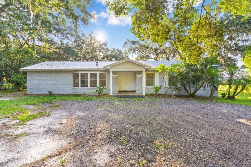 Welcome to 2802 Lyra Ln, a charming single-family home nestled on a sprawling 6.55-acre lot in Plant City, FL. This property, built in 1977, offers a peaceful retreat from the hustle and bustle of city life while still being conveniently located near all the amenities you could need.With 3 bathrooms and a total of 1,732 sq.ft. of finished living space, this home provides ample room for you and your family to spread out and make memories. The layout is functional and inviting, with a cozy living room, a dining area perfect for family meals, and a well-appointed kitchen with plenty of storage and counter space.The spacious bedrooms offer a comfortable place to rest and recharge, while the bathrooms feature modern fixtures and finishes. The large windows throughout the home flood the space with natural light, creating a warm and welcoming atmosphere.Step outside and discover the expansive 6.55-acre lot, complete with lush greenery and mature trees. The possibilities are endless with so much room to roam, whether you want to start a garden, raise animals, or simply enjoy the peace and quiet of nature. If you’re looking for a property that offers mature fruit trees such as bananas, sugar cane, logan, mangoes, and star fruit then this is your place.Located in Plant City, FL, this property offers the best of both worlds - a serene country setting with easy access to all the conveniences of city living. Enjoy shopping, dining, and entertainment options just a short drive away, as well as top-rated schools and medical facilities.Don't miss your chance to make this charming property your own. Whether you're looking for a peaceful retreat or a place to call home, 2802 Lyra Ln has everything you need and more. Schedule a showing today and start envisioning the possibilities for this special property. Property Updated Information since 2023. Metal roof, Septic Tank, Electrical panel, Waterheater, Windows, Kitchen cabinet and countertop, Lifetune vinyl plank Flooring, Walk-in showers, and new water system by Cullingan (Not included in the sale). Balance $2500. The Property has mature and fruit trees, including logan, mango, banana, star fruit, and sugarcane. If you're looking for a peaceful, quiet neighborhood and perhaps to raise animals or farm, this is the property. Move in ready!!