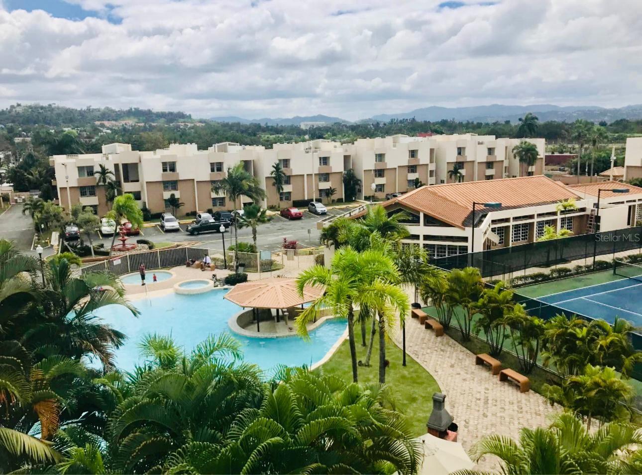 Under contract-accepting backup offers. Live in resort mode every day at Cond. Valles de Torrimar in Guaynabo, PR. Discover this charming penthouse that perfectly blends comfort, nature, and top-tier amenities. Enjoy a fresh, light-filled atmosphere and a lifestyle designed for your well-being. This walk-up penthouse, located on the third floor, features 3 bedrooms and 2 bathrooms, along with 2 parking spaces. Situated in a prime location, the property offers controlled access for added security and peace of mind. The community amenities are truly exceptional: a resort-style pool for your relaxing days, a fully equipped gym to energize your daily routine, sports courts to help you stay active and release stress, and a cozy lounge area perfect for socializing or unwinding. The HOA fee is just $161, and the location is close to everything you need—making it an ideal place to live or invest. Listed at $340,000 and eligible for FHA financing. Schedule your visit today and experience it for yourself. Bank pre-qualification or proof of funds is required.
