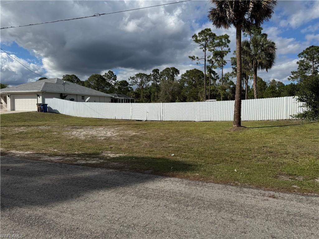 Photo of 1065 Lilac Street E, Lehigh Acres, FL 33974 (MLS # A4648894)