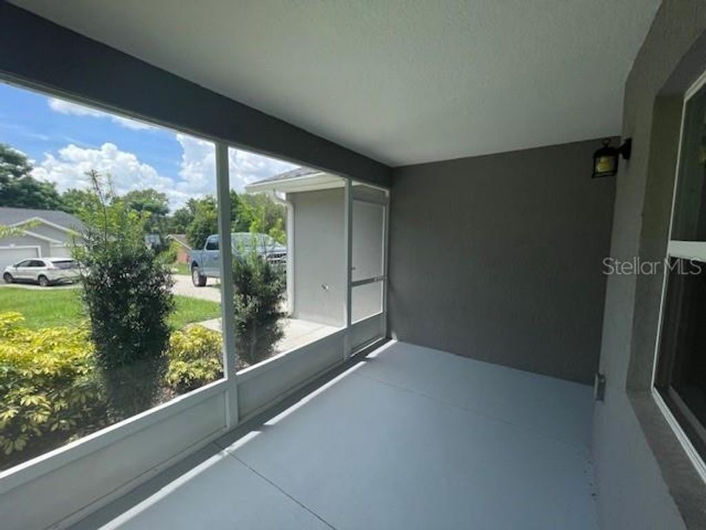 Photo of 1297 Wood Duck Lane, Fruitland Park, FL 34731 (MLS # G5100244)