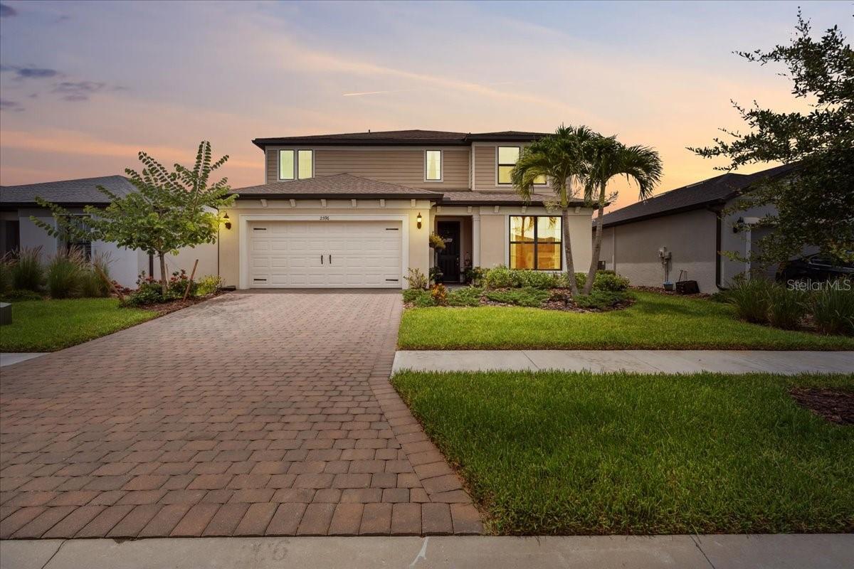 Welcome to this gorgeous five-bedroom (3 of the bedrooms have their own private bathrooms!), four-and-a-half-bath, plus office, tandem 3 car garage, waterfront residence located in the highly sought after community of Cedar Grove in North Port, Florida. Thoughtfully designed with both functionality and a modern farmhouse style, this spacious home offers over 3,400 sqft of versatile living spaces and stunning pond views via multiple large windows and sliders. Immediately upon entrance you begin to see the plethora of upgrades adorning this home. 8' doors throughout the main floor, custom wainscoting, oversized tile flooring, custom cotton greige painted walls, farmhouse light fixtures and more! Located to the right of the entrance, you’ll find a private guest suite complete with its own en-suite bathroom and large walk in closet, perfect for visitors or multigenerational living. Off to the left of the entrance is a mudroom and catch all space! Ahead you'll find a dedicated office with elegant double doors and a custom wood trimmed accent wall, providing the ideal space for working from home or having a quiet study. The expansive main living area features a family room with another custom wood trimmed accent wall, two dining space options with both wine and coffee bars and panoramic views of the serene pond and inviting rear lanai, creating a peaceful backdrop for everyday life. The beautifully appointed kitchen showcases: crisp white cabinetry, 42" uppers with soft close doors and drawers, multiple drawer pullouts, a lazy suzan corner cabinet, under cabinet lighting, quartz countertops, beautiful custom backsplash, stainless steel appliances with a built in oven and microwave, a huge walk-in pantry and is capped off with an oversized island that has farmhouse pendants, an upgraded deep basin sink, and generous prep space, perfect for gatherings and entertaining. There is also a convenient guest half bath with a pedestal sink. But before you head upstairs make sure to look under them to locate the ultimate Jr Man Cave or simply a ton more storage space if desired.
Upstairs, a large secondary living area on the upper level is currently set up as an arcade game room, but offers a flexible space for recreation, media, or play. The primary suite offers a great sized primary bedroom, huge walk-in closet, and a luxurious retreat with a seamless glass walk-in shower and a double vanity, providing both comfort and elegance. Three additional spacious bedrooms and two full bathrooms, (one is a private en-suite) provide ample room for family and guests. A sizeable laundry room with additional cabinetry and a big closet makes doing this chore a breeze.
The Cedar Grove community is a wonderful family centered place to call home! Low hoa fees include all aspects of lawn maintenance such as mowing, blowing, weeding, trimming, mulching and even irrigation. There is also a 1/2 basketball court, covered playground, serenity viewing area and resort like pool area. This location offers easy access to HWY 41 and I75, parks, highly rated schools, and local amenities including the North Port Water Park. With its well-planned layout, thoughtful upgrades, and scenic surroundings, this property is the perfect place to call home. So don't let your dream home become someone else's address, setup your showing today! * Please check out the virtual tour and fly through video for even more details *