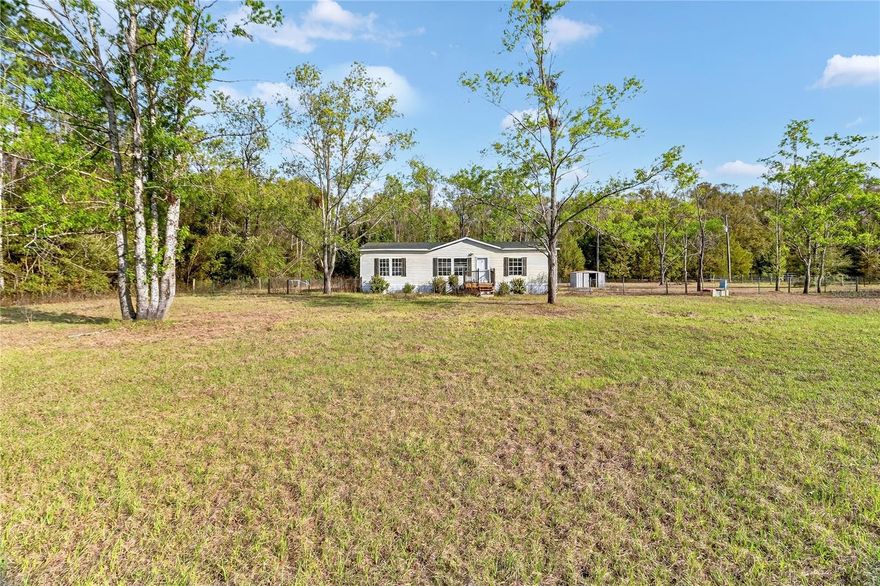 One or more photo(s) has been virtually staged. Newly remodeled and upgraded manufactured home. Suitable for owner occupancy or use as a rental property, this home offers durable luxury vinyl plank floors, new appliances, a new roof, fencing and more. The over-sized 1+ acre lot provides ample room for outbuildings and outdoor activities.