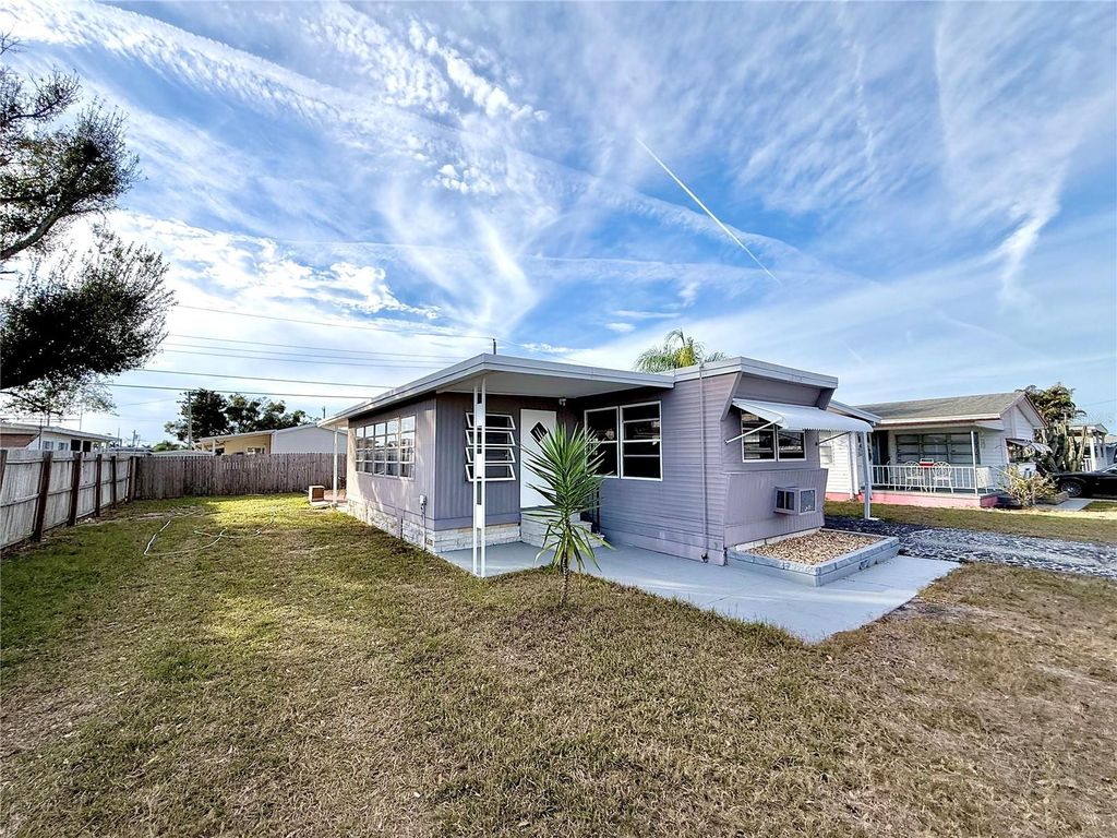 Photo of 1909 Lullaby Drive, Holiday, FL 34691 (MLS # TB8467377)
