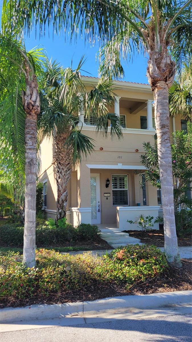 Short term/seasonal only! Want to enjoy resort style living in a tropical paradise close to all the action and convenience of University Parkway corridor but in a secluded, lushly landscaped enclave. Then this is your place. This end townhome is a natural light filled space (with extra windows), with 3 bedrooms and 2 1/2 bathrooms looking out on a large lake. The townhome is comfortably furnished and has an open floor plan with wood flooring and tile on the ground floor and carpeting upstairs in bedrooms. The kitchen has solid wooden cabinetry, Corian countertop and breakfast bar, custom backsplash and pantry, The bedrooms can sleep your small army. There is a single car, rear entry garage with additional parking. This home is close to I-75, the new UTC mall, airport, shopping and dining, downtown Sarasota and the beaches. This community is small and has impressive amenities including a large heated pool with paver deck and covered seating area, two lighted tennis courts, basketball, play ground, grilling area and gazebo. NOW AVAILABLE beginning May 1, 2025 . High season rates are $4500/month Dec thru April with a 3 month minimum. Call now for your time in the Florida sun!