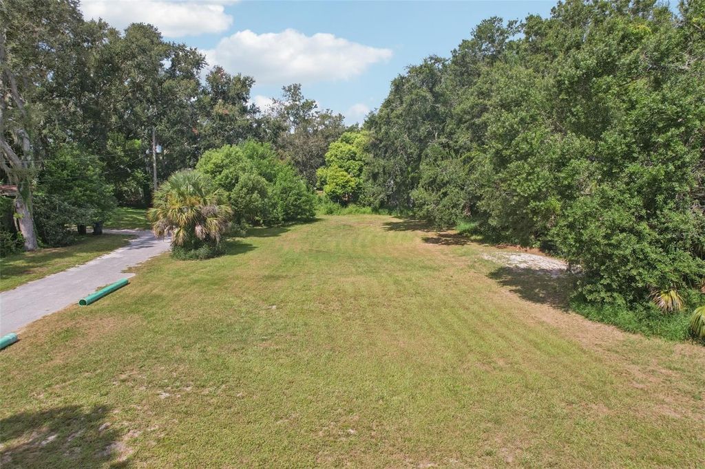 Photo of 757 Lake Jessie Drive, Winter Haven, FL 33881 (MLS # TB8427058)