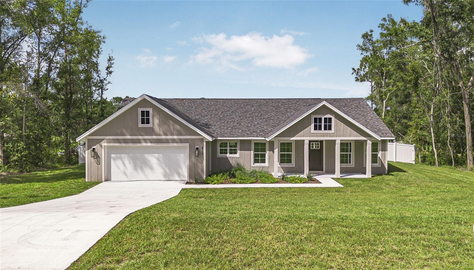 Enjoy the difference that award-winning quality makes in this stunning Citrus Springs home. Beautifully designed with meticulous attention to every detail. This split open floor plan features a dream kitchen with sleek quartz countertops, upgraded cabinets and a fabulous walk in pantry. Throughout the main living areas, you'll find durable luxury vinyl planking, offering both beauty and easy maintenance. Unwind in your spacious primary bedroom, complete with an ensuite bathroom and walk-in closet, offering your own sanctuary. Practicality meets convenience with an inside laundry room and a double-car garage. Step outside to your own oasis surrounded by a vinyl privacy fence. The best part? There's no HOA! Embrace the Florida outdoors with Citrus Springs 18-hole golf course being literaly around the corner, hike/bike the Withlacoochee Trail, kayak or float down the crystal clear waters of the Rainbow River – it's all practically on your doorstep!