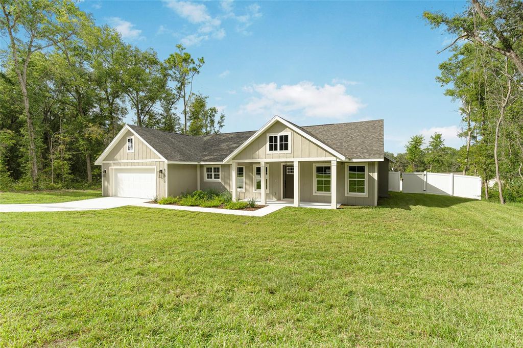 Photo of 8727 N Golfview Drive, Citrus Springs, FL 34434 (MLS # OM706803)