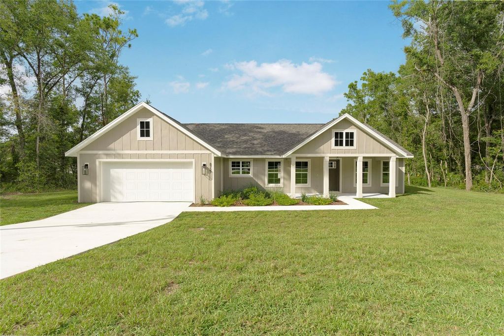 Photo of 8727 N Golfview Drive, Citrus Springs, FL 34434 (MLS # OM706803)